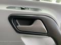 Interior door handle of a 2017 Mercedes-Benz Sprinter with a sleek design and textured grip