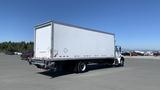 A 2019 International 4300 truck with a white box cargo area and a black rear bumper positioned in a parking lot