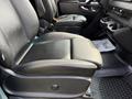 The image shows the interior of a 2019 Mercedes-Benz Sprinter featuring black leather seats with manual controls and storage compartments