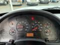 Dashboard of a 2007 International 4200 with various gauges showing speed fuel and engine temperature