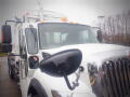 A white 2008 International 7400 truck with chrome detailing large side mirrors and a prominent front grille