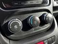 Interior controls of a 2019 RAM Promaster with three round knobs for temperature and air conditioning settings