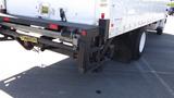 2009 Hino 268 truck with a white cargo box and a black hitch attachment at the rear