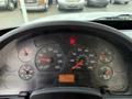 Dashboard of a 2007 International 4200 displaying various gauges including speedometer, RPM, fuel level, and warning indicators