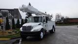 A 2005 International 4300 bucket truck with an extended articulating boom and a utility body mounted on the chassis