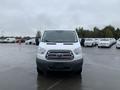 Front view of a white 2017 Ford Transit van with a distinct grille and headlights