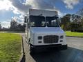 A white 2017 Freightliner M Line delivery truck with a large front windshield and a distinct grille design facing the viewer