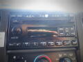 Dashboard of a 2007 Ford F-650 featuring a radio with various buttons and dials for control and settings