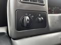 Control panel of a 2008 Ford F-750 featuring switches for lights and other vehicle functions