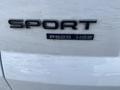 A 2020 Land Rover Range Rover Sport badge displaying the word SPORT and the model designation P525 HSE