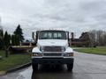 A 2008 Sterling Acterra truck facing forward with a white cab and chrome details