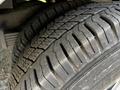 Close-up view of a 2015 Chevrolet Express tire showcasing its tread pattern and wear details