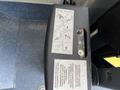 A close-up of the control panel for a 2017 Chevrolet Express featuring operation instructions and buttons for manual operation