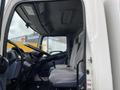 Interior view of a 2008 Hino Conventional Cab showing the driver's seat steering wheel and dashboard