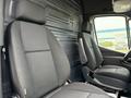 Two black seats inside a 2019 Mercedes-Benz Sprinter van with a gray interior