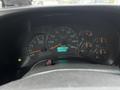 Dashboard of a 2005 GMC C5 Duramax displaying speedometer fuel gauge and odometer reading 55303 kilometers