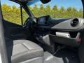 Interior view of a 2022 Mercedes-Benz Sprinter showing the driver's seat dashboard and control panel