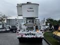 A 2011 Western Star Trucks 4900 with a bucket lift mounted on top for utility work