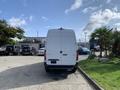 A white 2021 Mercedes-Benz Sprinter van parked with its rear facing the viewer