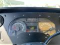 Dashboard of a 2011 Ford Econoline displaying speedometer RPM gauge fuel gauge and warning lights