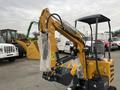 A yellow 2024 AGT Industrial MX12R Mini Excavator with a hydraulic arm and bucket wrapped in protective material