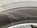 Close-up of a 2014 RAM 5500 tire showcasing the safety warning text molded into the rubber surface