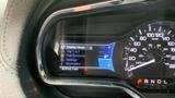 Dashboard display of a 2013 Lincoln MKT showing trip information fuel economy settings and mileage