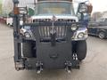 A 2016 International 7400 truck with a rugged front grille and attached plow blade designed for snow removal