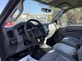 Interior of a 2016 Ford F-350 SD showing the steering wheel dashboard and front seats