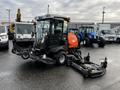 A 2020 Jacobsen HR800 lawn mower with a compact design featuring a cabin for the operator and a large cutting deck at the front