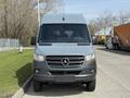A 2019 Mercedes-Benz Sprinter van facing forward with a gray exterior and the iconic three-pointed star logo on the front grille
