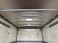 Interior view of a 2017 Kenworth T370 truck trailer featuring a curved ceiling with two circular light fixtures and a smooth, clean surface