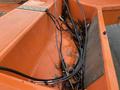 Close-up of the interior of a 2008 Fassmer 20 Foot Fast Rescue boat showing a collection of tangled cables on an orange surface