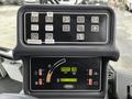 Control panel of a 2007 Tennant Sentinel featuring buttons for operation and a digital display showing RPM and speed indicators