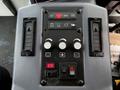 A control panel from a 2007 Tennant Sentinel featuring multiple switches and buttons for various functions like power controls and fan operation