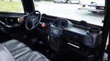 Interior view of a 2018 Kubota RTV X1100C showing the dashboard with controls gauges and seating for two