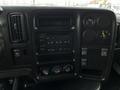 Dashboard of a 2005 GMC C5 Duramax featuring controls for radio climate settings and various switches