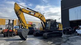 2018 Caterpillar 326F L Excavator with yellow and black color scheme features a large bucket attached to its arm and tracks for mobility