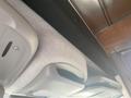 Interior view of a 2017 Mercedes-Benz Sprinter showing overhead storage compartments and a textured ceiling