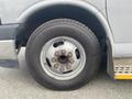 A close-up of a silver 2017 Chevrolet Express van wheel showcasing the tire and rim details