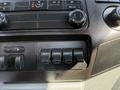 Interior dashboard of a 2016 Ford F-350 SD featuring control knobs and four auxiliary switches labeled AUX 1 to AUX 4