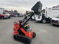 A red and black 2024 AGT Industrial LRT23 mini loader with a raised bucket and compact tracks