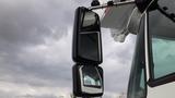 Side mirrors of a 2008 International 7500 truck showing a reflective surface and a sturdy design