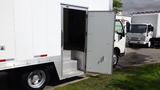 A 2016 Hino 195 box truck with the side door open revealing a metal step and interior cargo space