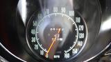 Speedometer of a 1971 Chevrolet Corvette Stingray displaying 85182 miles with the needle pointing below 20 mph