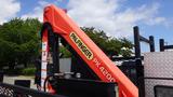 A 2014 RAM 5500 equipped with a Palfinger PK 4200 crane attached to the truck bed