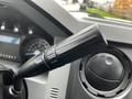 Close-up of the turn signal lever on the steering column of a 2011 Ford F-250 SD