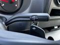 Close-up of a gear shifter in a 2022 Mercedes-Benz Sprinter showing positions for reverse R neutral N and drive D