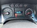 Dashboard of a 2010 Ford F-150 showing speedometer fuel gauge and odometer readings