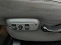 The image shows the seat adjustment controls of a 2008 Dodge Ram 5500 with two buttons and a lever for adjusting the seat position